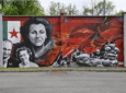 “Milano è Memoria”, il volto dei partigiani Onorina Brambilla, Carla Capponi e Giovanni Pesce su un murales alla Cittadella degli Archivi