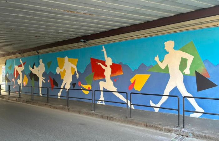 Sesto San Giovanni, prende forma il murale per il passaggio della Fiamma Olimpica